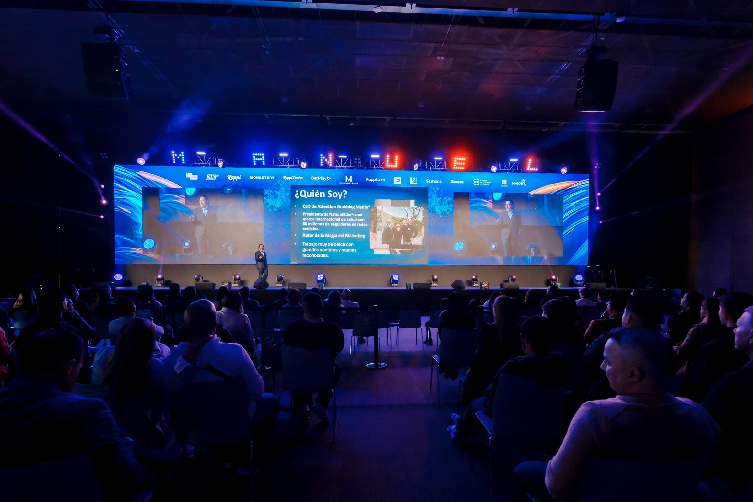 Manuel Suarez on stage in Bogotá, wide view of the full room at Game Changers 2025