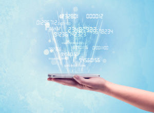 A white hand holding a tablet smartphone with digital numbers and information escaping the device illustration concept